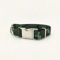 Green camouflage dog collar with metal side-release buckle and welded D-ring